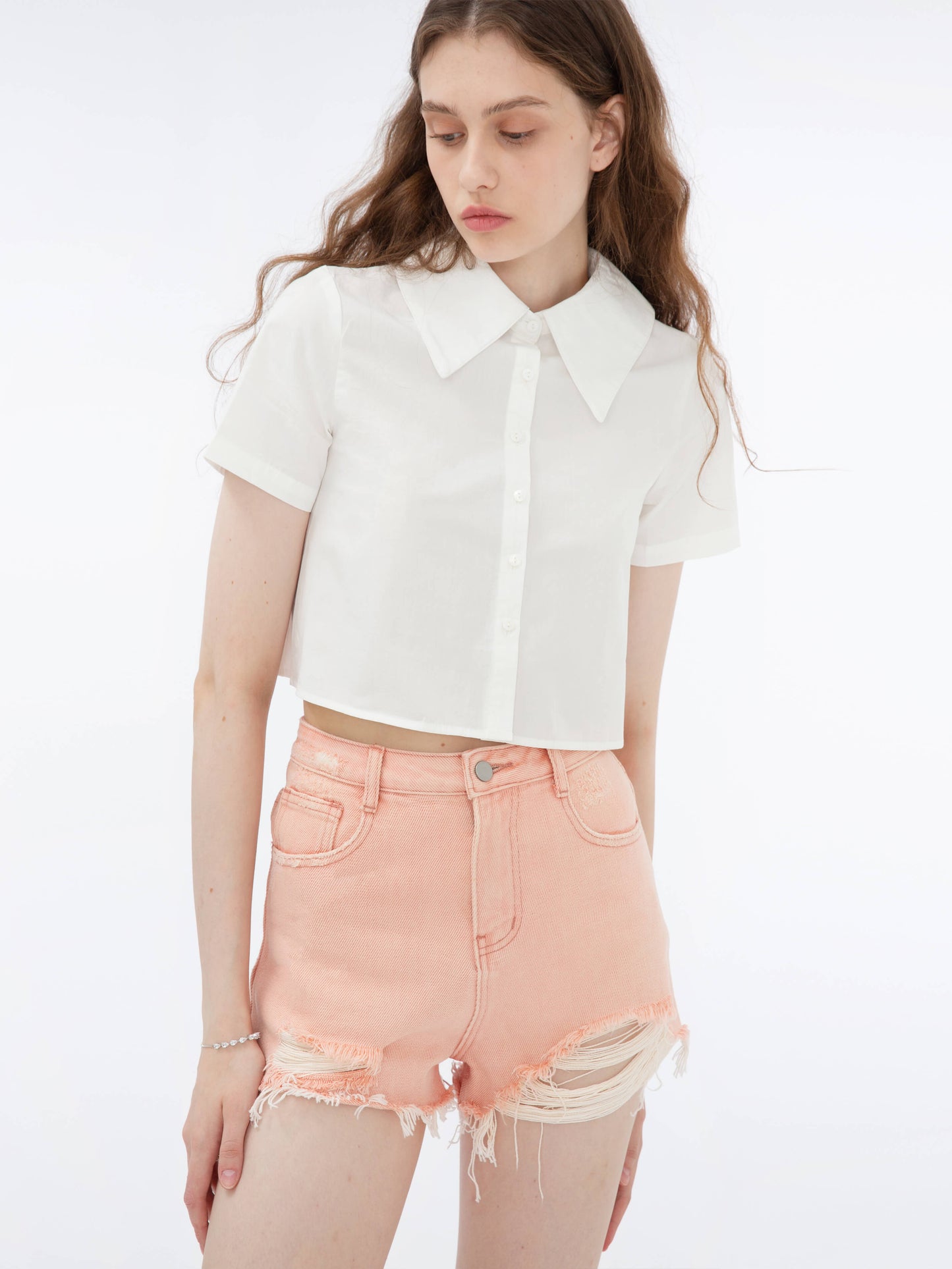 Raw Edge Distressed Mini Shorts
